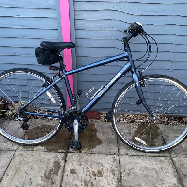 A hybrid bike freshly serviced by JJW Bicycle Repairs, cleaned and ready to ride